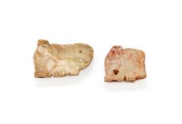 Two Chinese mottled jade dragon pendants
