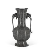 A Chinese twin handled pewter vase