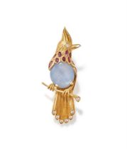 A STAR SAPPHIRE, RUBY AND DIAMOND BIRD BROOCH