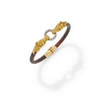 Y GAY FRERES, A TORTOISESHELL AND GEM SET BANGLE