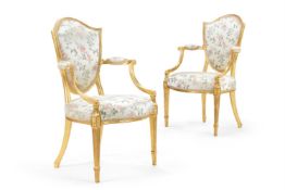 ‡ A PAIR OF GEORGE III GILTWOOD ARMCHAIRS, CIRCA 1790
