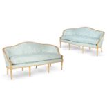 ‡ A PAIR OF GEORGE III GILTWOOD SETTEES, CIRCA 1785