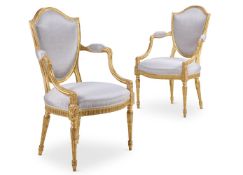 ‡ A PAIR OF GEORGE III GILTWOOD ARMCHAIRS, ATTRIBUTED TO GILLOWS, CIRCA 1790
