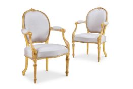 ‡ A PAIR OF GEORGE III GILTWOOD ARMCHAIRS, CIRCA 1775