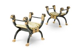 ‡ A MATCHED PAIR OF REGENCY BRONZED AND PARCEL-GILT X-FRAME STOOLS, CIRCA 1810