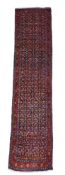 A PERSIAN FARAHAN RUNNER OR GALLERY CARPET