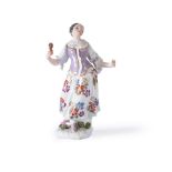 A MEISSEN FIGURE OF COLUMBINE FROM THE COMMEDIA DELL'ARTE, MID 18TH CENTURY