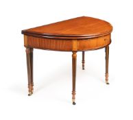 Y A SATINWOOD, TULIPWOOD CROSSBANDED, BEECH, LINE INLAID AND EBONISED FOLDING TEA TABLE