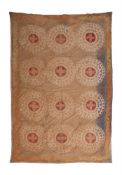 AN EMBROIDERED SUZANI TEXTILE, EARLY 20TH CENTURY AND PROBABLY LATER BACKED AS A WALL HANGING