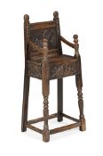 AN OAK CHILD'S HIGH ARMCHAIR, 17TH CENTURY