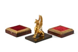 A GILT BRONZE AND MARBLE GRIFFIN PAPERWEIGHT, EARLY 19TH CENTURY
