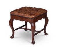 A MAHOGANY AND BUTTON LEATHER UPHOLSTERED STOOL IN GEORGE I STYLE, SECOND HALF 19TH CENTURY