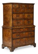 A WALNUT FEATHERBANDED CHEST ON CHEST, CIRCA 1740 AND LATER