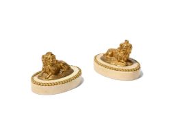 A PAIR OF FRENCH GILT BRONZE DOG PAPERWEIGHTS OR PRESSE PAPIERS, LATE 19TH CENTURY