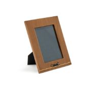 CARTIER, A BROWN LACQUER PHOTO FRAME