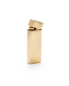 CARTIER, A GOLD SLEEVE LIGHTER