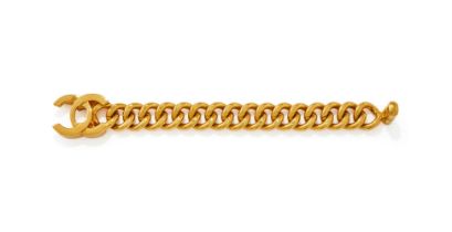 CHANEL, CC TURNLOCK, A GILT BRACELET