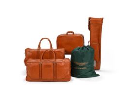 GOLF BROTHERS FOR ASTON MARTIN, A FOUR PIECE LEATHER LUGGAGE SET