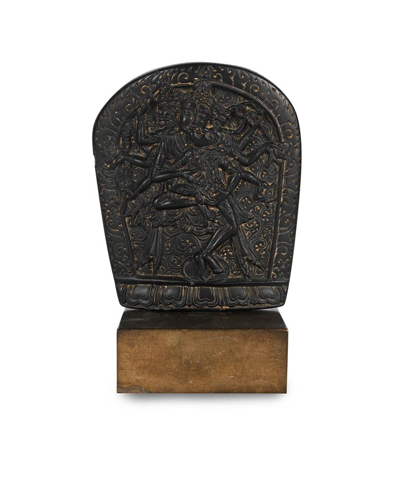 A small black stone stele depicting Samvara