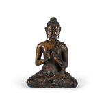 A seated bronze figure of Buddha