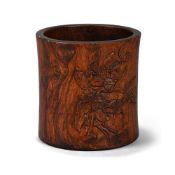 A Chinese carved huanghuali brush pot