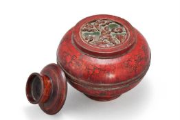 A Chinese red lacquer box and cover