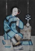 A pair of Chinese reverse glass paintings of ladies