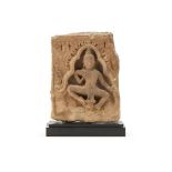 A small Khmer sandstone relief fragment depicting an Apsara