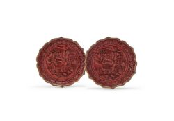 A pair of Chinese cinnabar lacquer lobed dishes