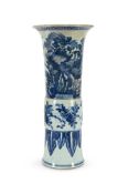 A large Chinese blue and white beaker vase
