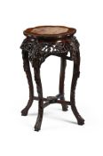 A Chinese hardwood and marble topped jardinière stand