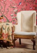A GEORGE II MAHOGANY WING ARMCHAIR, CIRCA 1730