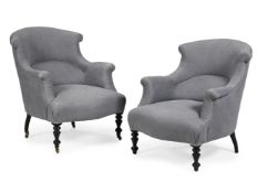 A PAIR OF EBONISED AND UPHOLSTERED ARMCHAIRS, EARLY 20TH CENTURY