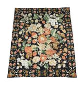 A NEEDLEPOINT FLORAL CARPET