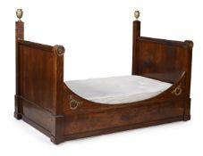 A LOUIS PHILIPPE MAHOGANY AND ORMOLU MOUNTED BED OR LIT EN BATEAU, MID 19TH CENTURY