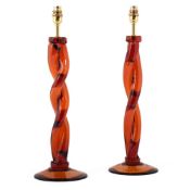 A PAIR OF TWISTED AMBER GLASS LAMPS, BY TODHUNTER EARLE, MODERN