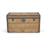 A FRENCH STRIPED TRAVELLING TRUNK, MAISON ARMAND BEGA, PARIS, CIRCA 1910