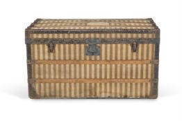 A FRENCH STRIPED TRAVELLING TRUNK, MAISON ARMAND BEGA, PARIS, CIRCA 1910