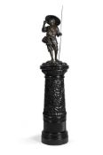 A JAPANESE BRONZE MODEL OF A FISHERMAN, CIRCA 1900