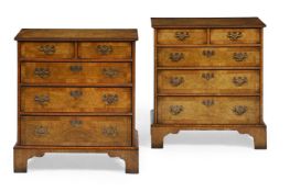 A PAIR OF WALNUT BEDSIDE CHESTS OF DRAWERS, IN GEORGE II STYLE, OF RECENT MANUFACTURE