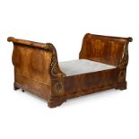 A LOUIS PHILIPPE AMBOYNA AND GILT METAL MOUNTED SLEIGH BED, MID 19TH CENTURY
