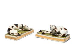 A PAIR OF DERBY (STEVENSON & HANCOCK) MODELS OF RECUMBENT HOUNDS, LATE 19TH CENTURY
