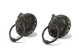 A MATCHED PAIR OF PATINATED METAL KNOCKERS, PROBABLY INDIAN, 20TH CENTURY