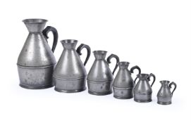 A SET OF SIX IRISH GRADUATED PEWTER 'HAYSTACK' MEASURES, FIRST HALF 19TH CENTURY