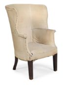 A BARREL-BACK WING ARMCHAIR, IN GEORGE III STYLE, 19TH CENTURY