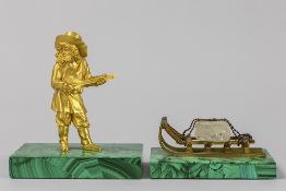 two small antique presumably Russian sculptures in gilded bronze on a malachite base : Sledge with
