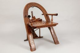 antique Russian "trompe l'oeil" armchair in walnut in the shape of a yoke and with fine carvings