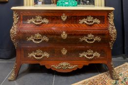 baroque Louis XIV style chest of drawers with typical bronze mountings and handles and with marble