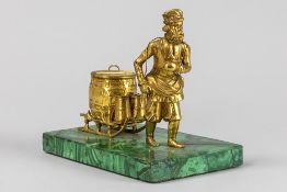 small antique presumably Russian sculpture in gilded bronze on a malachite base : "Man with milk