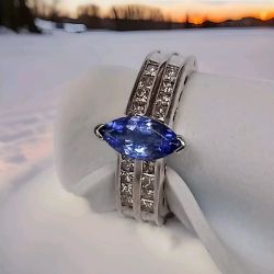 18CT WHITE GOLD MAQUISE 1CT TANZANITE & 0.80CT PRINCESS DIAMOND RING+ VALUATION CERTIFICATE £3495